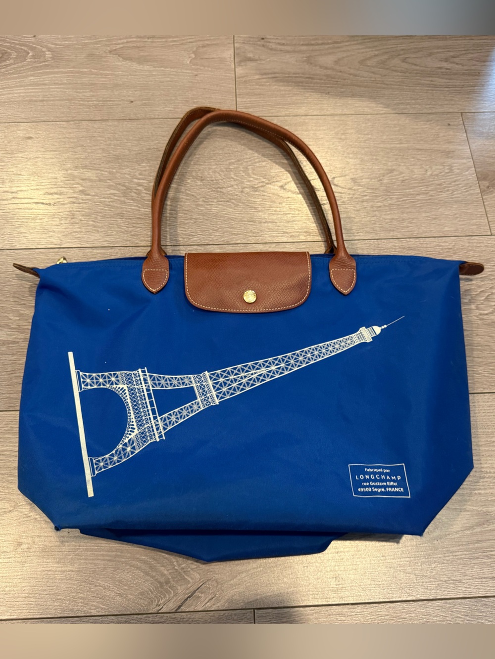 Longchamp Royal Blue Tote with Brown Leather Trim and Eiffel Tower Print